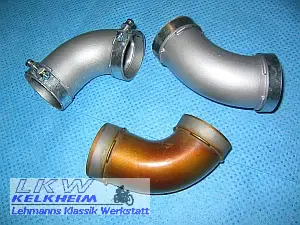 Goldene bzw. silberne Ansaugtrichter der BMW R75/5